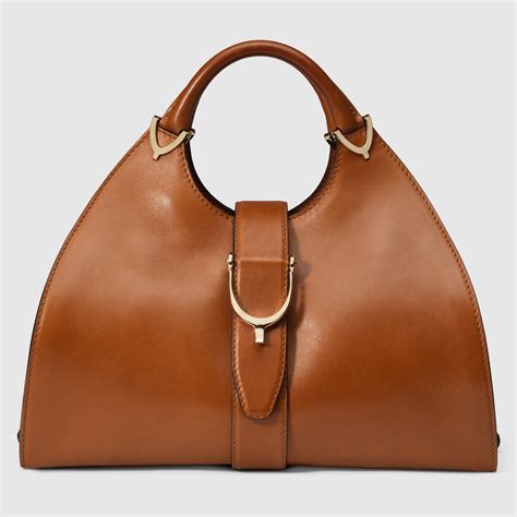 gucci stirrup top handle bag|gucci top handle bag vintage.